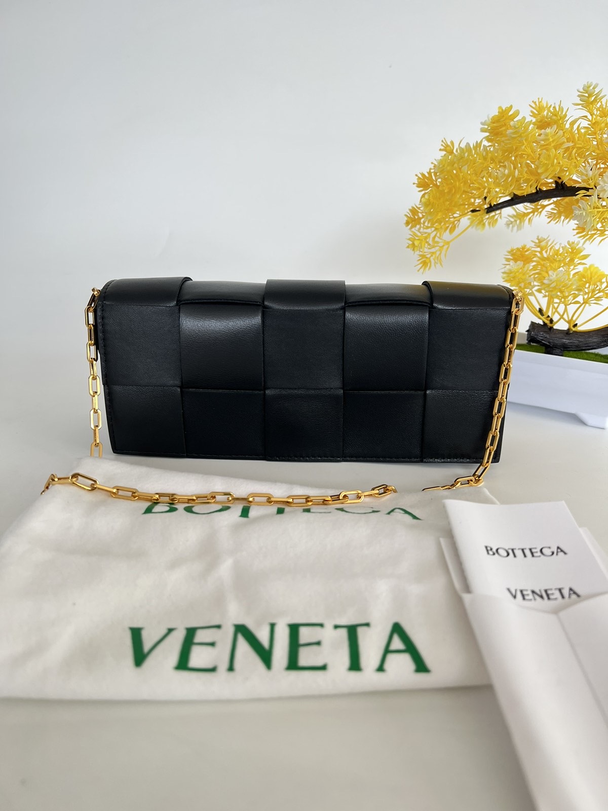 Bottega Veneta Baguette Pochette on Chain in Black