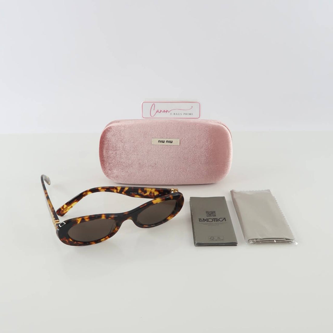 MU 06ZS Havana Brown Tortoiseshell Frame With Distinctive Gold-Tone Lettering On The Sculpted Arms Sunglasses