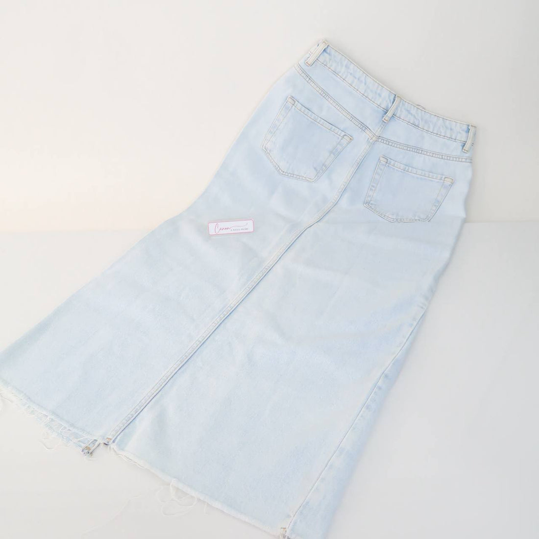 Denim Mini Skirt With Frayed Hem And Front Slit