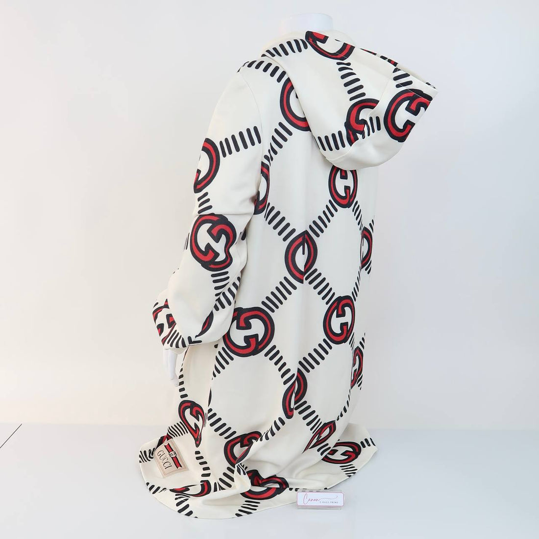 Technical Jersey Hoodie Dress in a cream color with a red and lie monogram print