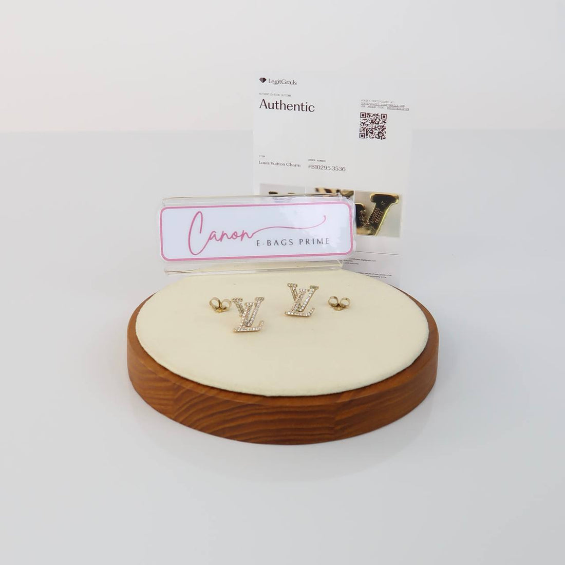 Iconic Stud Earrings with a Gold-Color Finish and Crystal Embellishment