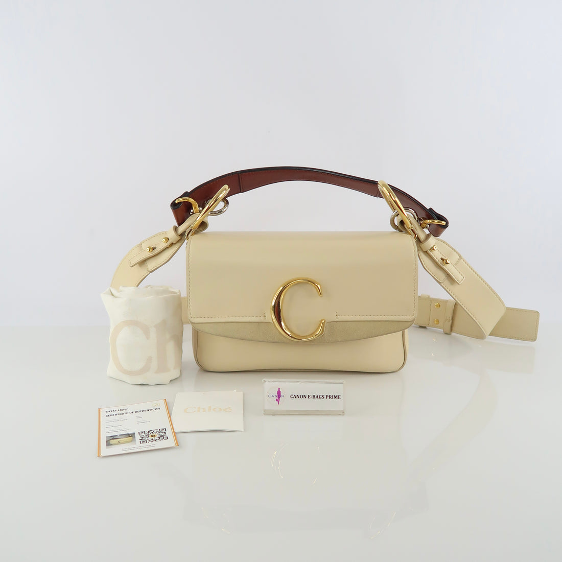 C Carry Top Handle Crossbody Bag