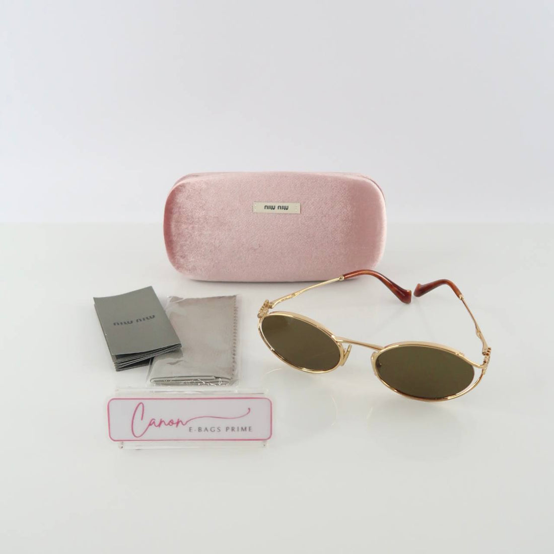 SMU 52Y Metal Oval Feature Distinctive Sculpted Arms Brown Tinted Lenses Sunglasses