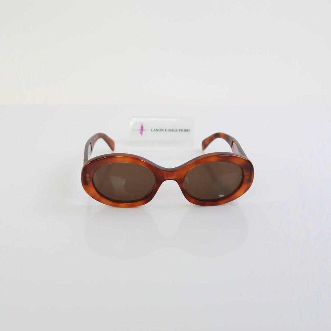 Triomphe Havana Oval Sunglasses