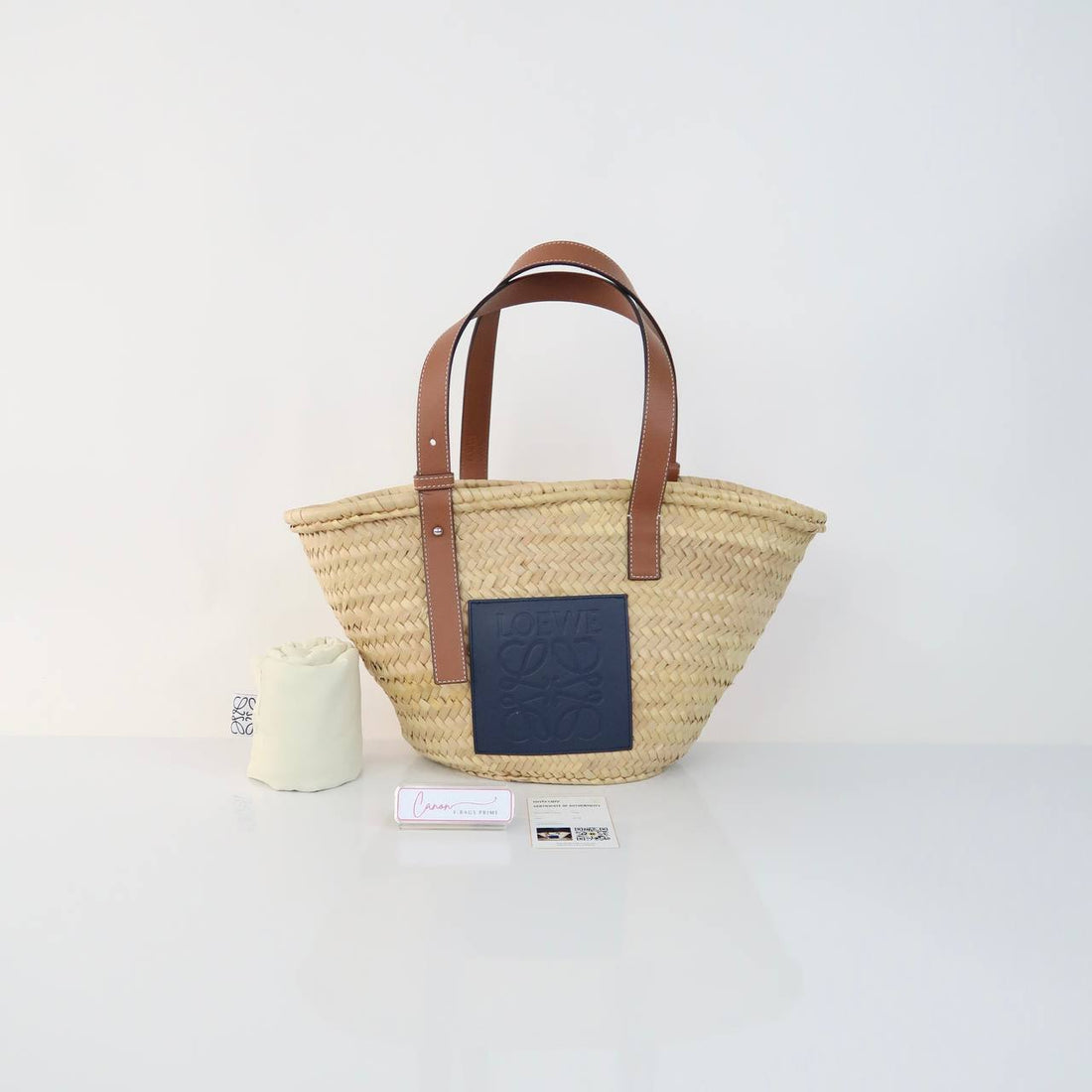 Raffia Embossed Anagram Basket Bag