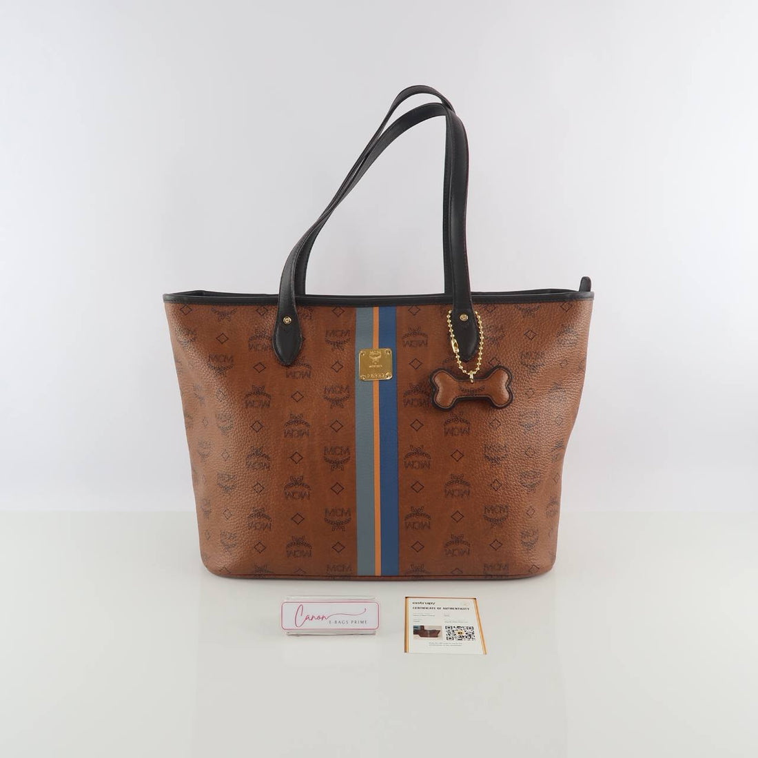 Top Zip Shopper Bag Visetos Monogram Print and a Central Blue & Orange Striped Details