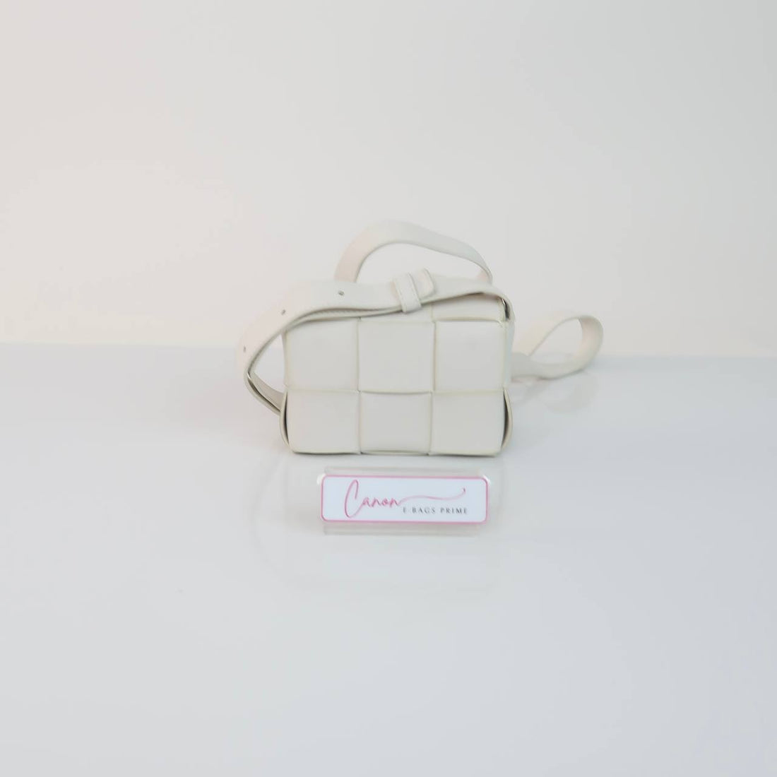 Cassette Woven Leather Sling Bag