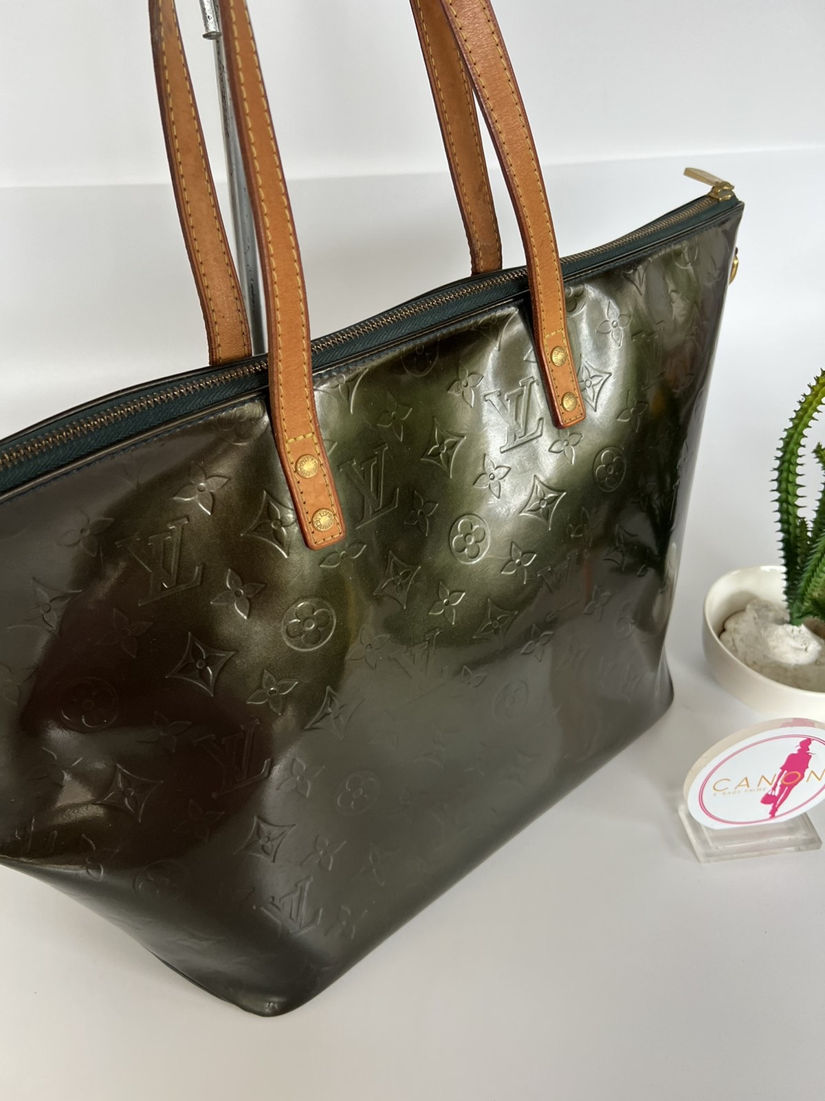 Sold at Auction: Louis Vuitton, a Bellevue raisin shine leather Monogram  Vernis bag
