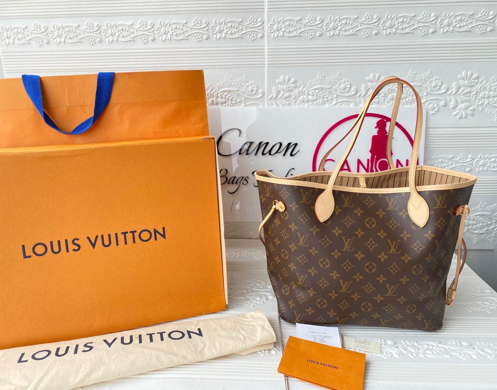 Louis Vuitton Monogram Neverfull MM. Made in France. DC 2019 - Canon E-Bags Prime