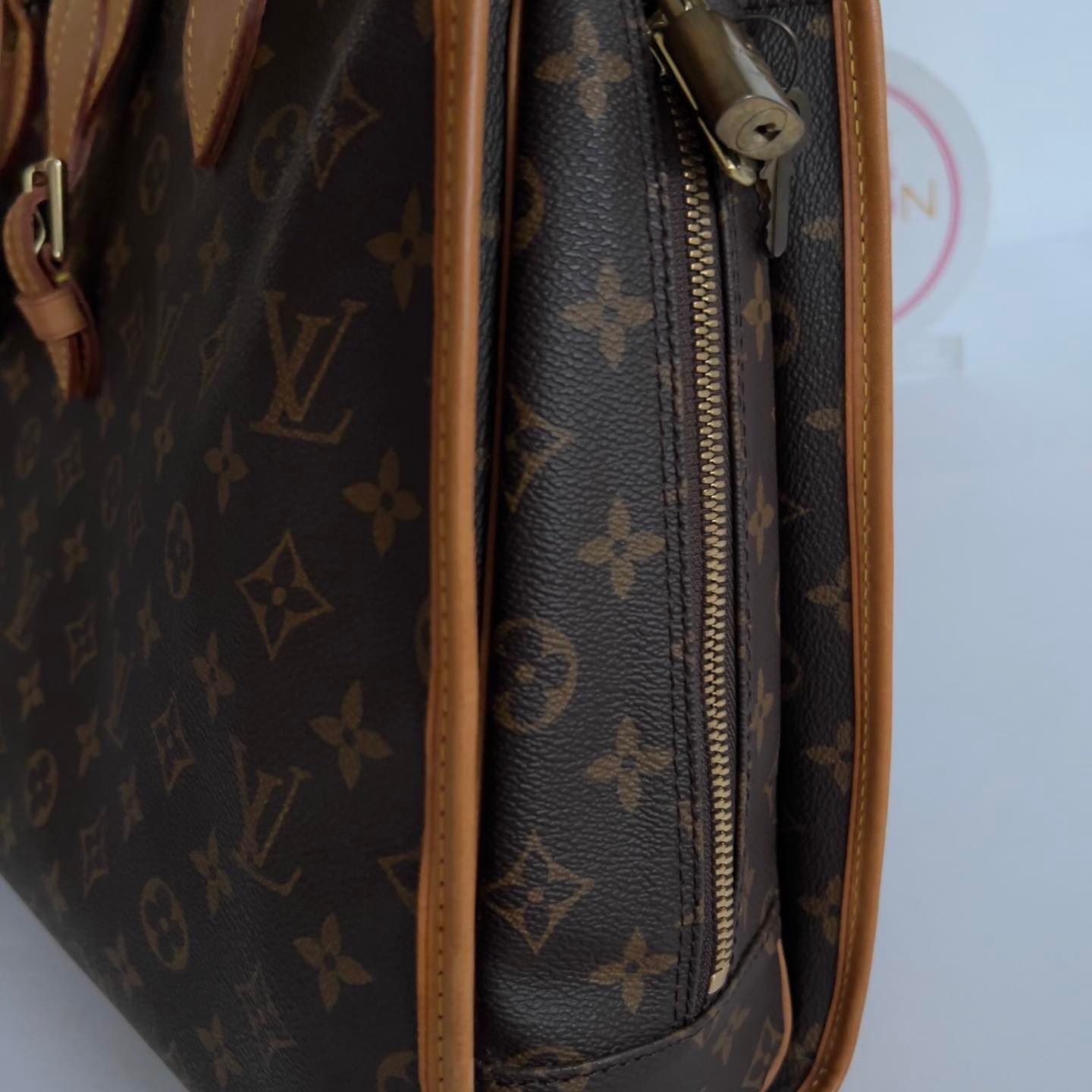 Louis Vuitton Monogram Rivoli Briefcase Bag. Made in France. DC: MI1927