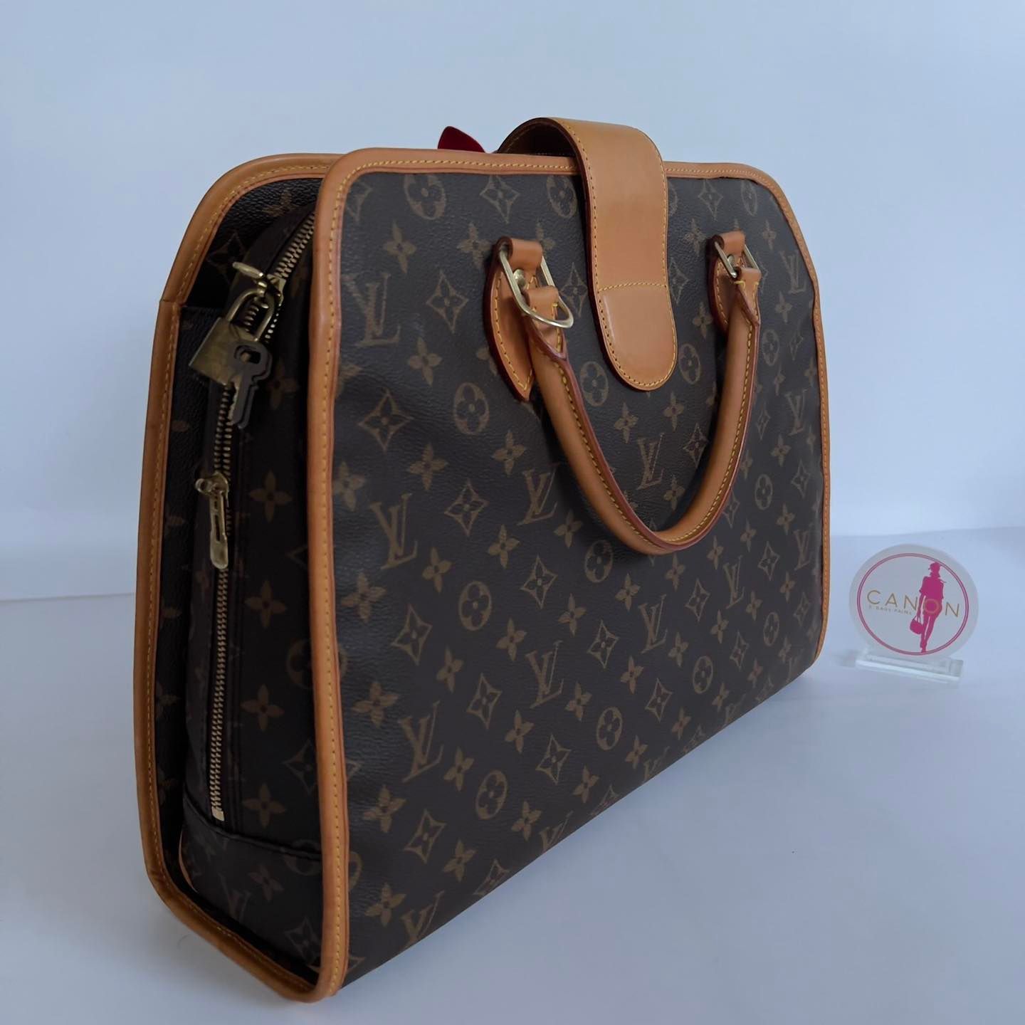 Louis Vuitton Monogram Rivoli Briefcase Bag. Made in France. DC: MI1927 -  Canon E-Bags Prime