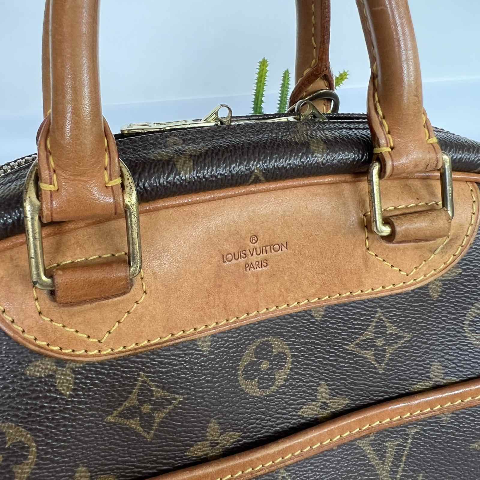Louis Vuitton Monogram Canvas Trouville. Made in France. DC: MI0014. With  certificate of authenticity from ENTRUPY.
