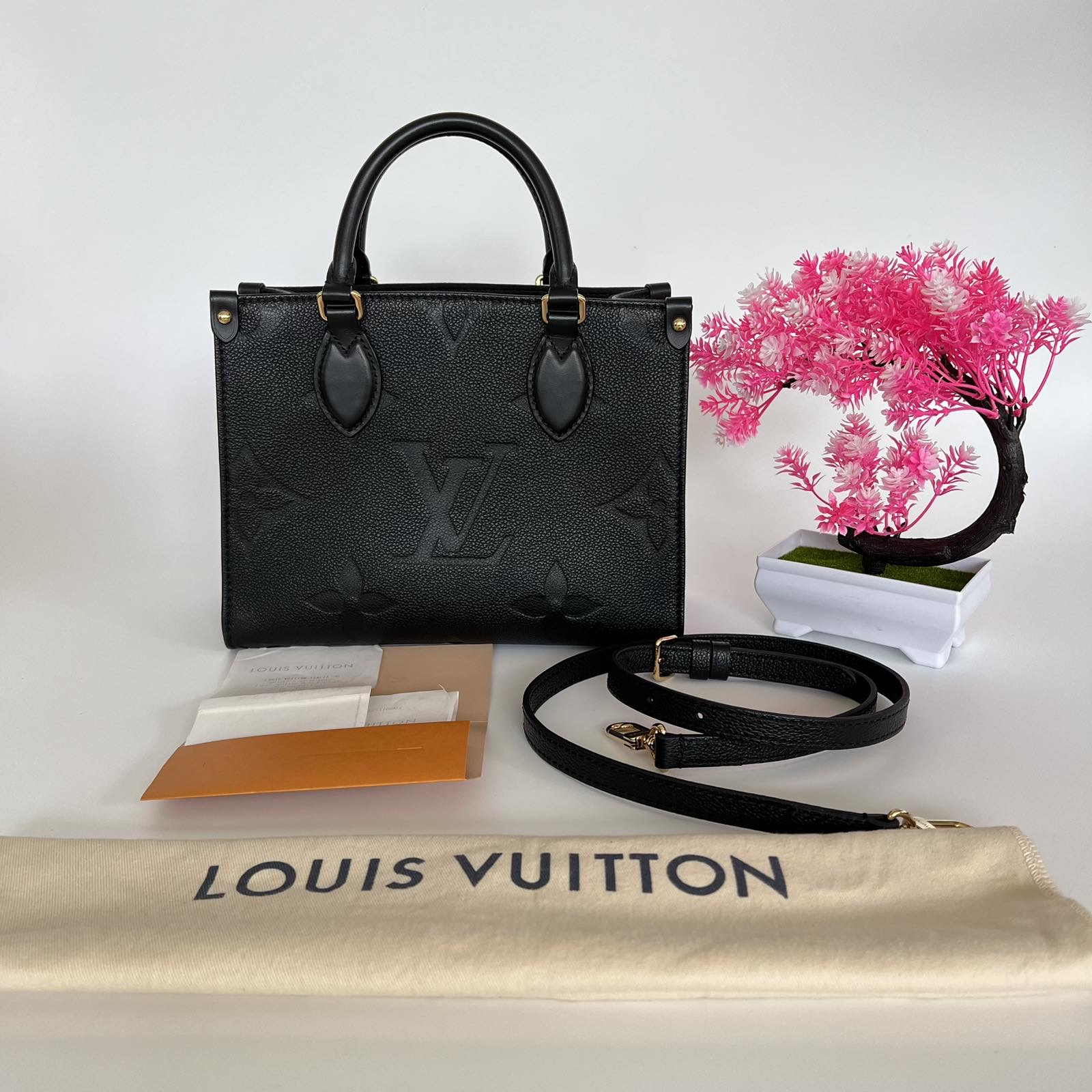 SOLD/LAYAWAY💕 Louis Vuitton Black Empreinte On The Go PM. Microchip. With  long strap, care cards & dustbag ❤️