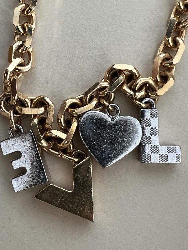 LOUIS VUITTON monogramme Fall In Love bracelet réglable cœur d'occasion  M8024A