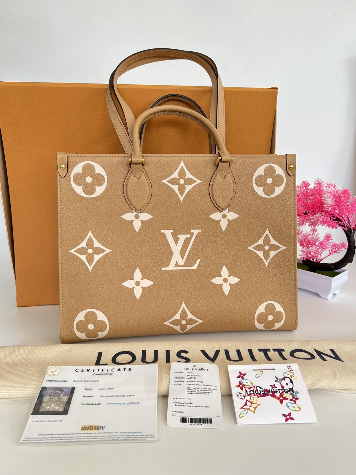 Louis Vuitton Monogram Canvas Lockit. DC: CA0056. Made in Spain